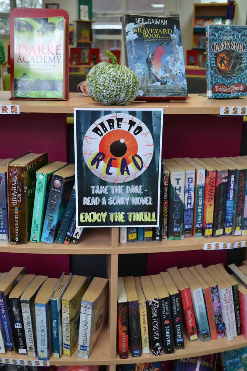 AmeryHillAlton's tweet photo. Our Halloween display in the Library is looking fabulous, thanks to our student librarians and the creativity of students who attend the extra-curricular crochet and knitting club. This term's #DaretoRead competition has been really popular too! @AmeryLibrary #educationforlife https://t.co/ym8wHAz5Qj