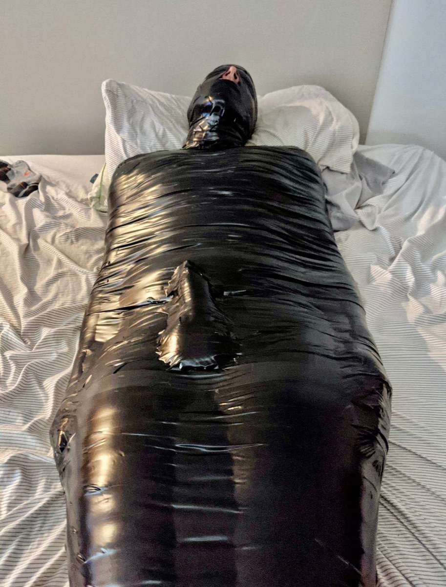 Q: Does anything go under the tape?

A: Plastic wrap typically. Though I’ve done the tape directly on skin several times (such as this photo). You sweat a lot so it doesn’t feel bad coming off. Sometimes when you’re horny you try some stuff. Right?