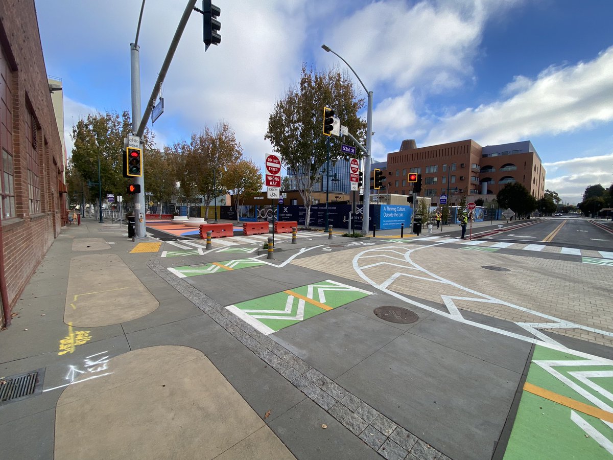 JohnBauters's tweet photo. Excited to see our latest Level 5 traffic diverter on the Horton St Bike Blvd at 53rd St. Proud to have negotiated this closure, added curb-height bike lanes, and new pedestrian connectivity across the UPRR as part of the Emery Yards project. Safe streets save lives! https://t.co/Dza2Oxbn7N