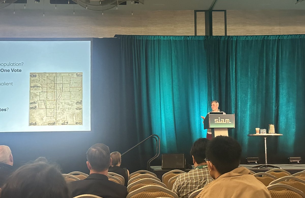 Enjoying another great plenary! Moon Duchin is presenting some amazing work on the intersection between math, data, elections, and social choice!