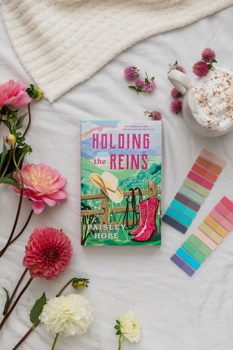 In this steamy cowboy romance from Paisley Hope a woman returns to her family's ranch after a broken engagement and finds herself falling for her brother's best friend—the first novel in the Silver Pines Ranch series. HOLDING THE REINS is out today!