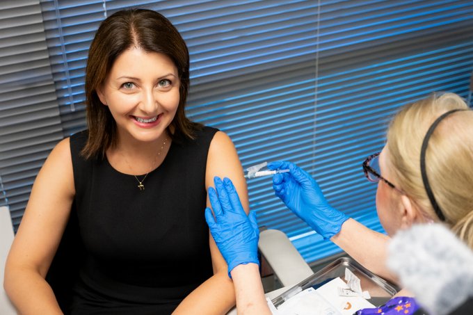 Dr. Cohen receives a Covid vaccine. 