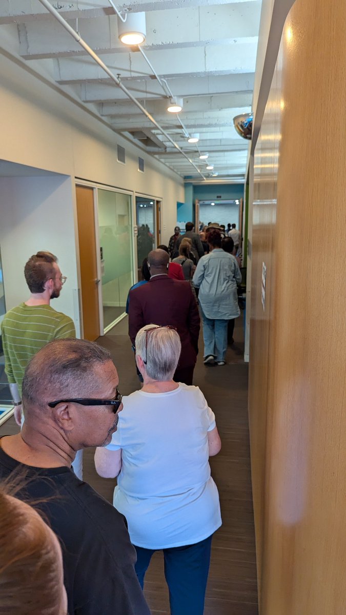 In line for early voting in Kansas City, Missouri. Today is the first day for "no excuses" early voting.

At least 50 in front of me at The Whole Person. This election is going to set a record for largest ever American turnout.