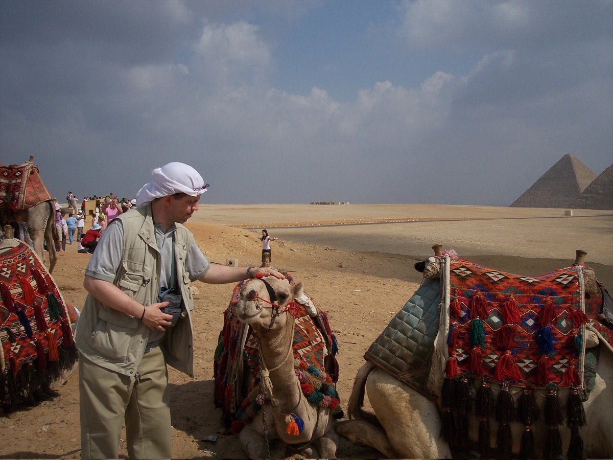 Neilfan12's tweet photo. ①⑥🐪16 Years ago today: Fulfilled lifelong dream of seeing #Sphinx & #GreatPyramids of #Egypt in person. Pics I took. 1st: #Pyramids & Sphinx, 2nd: me petting #camel, 3rd: me riding one by pyramid (it's my Twitter avatar) & 4th: collecting sand by pyramid.
#Egypt16thAnniv 🔺🐪 https://t.co/2C9MdmB6We