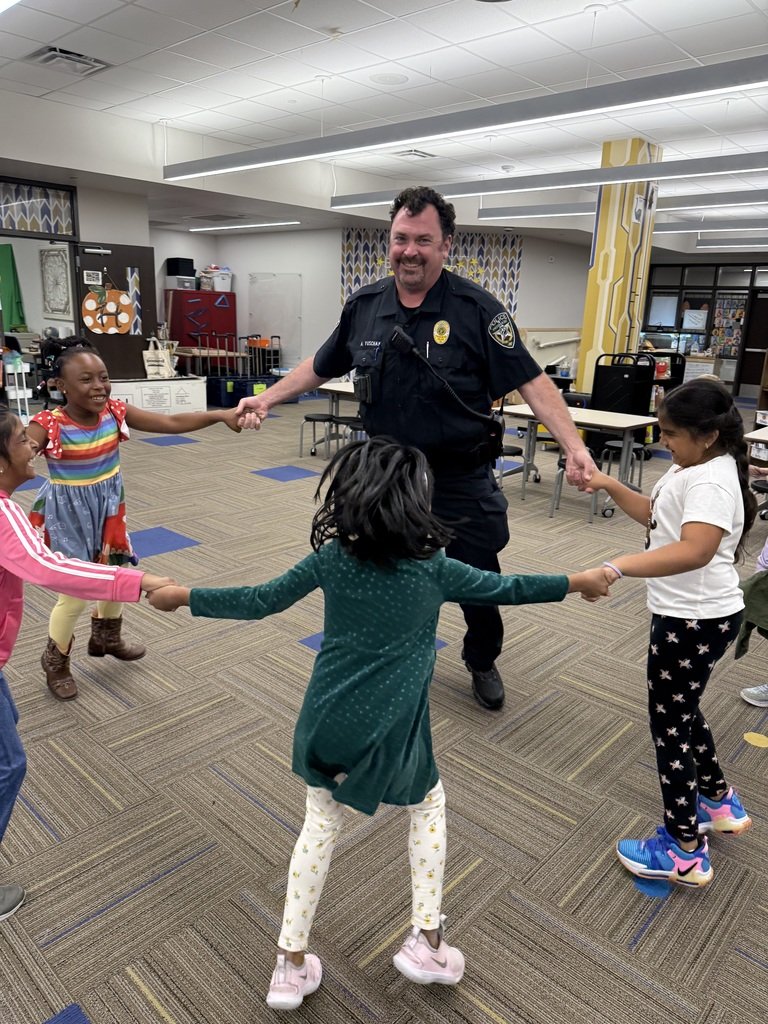 Officer Yuschak stopped to have some fun in the library. We are so thankful for him for keeping our students and staff safe!