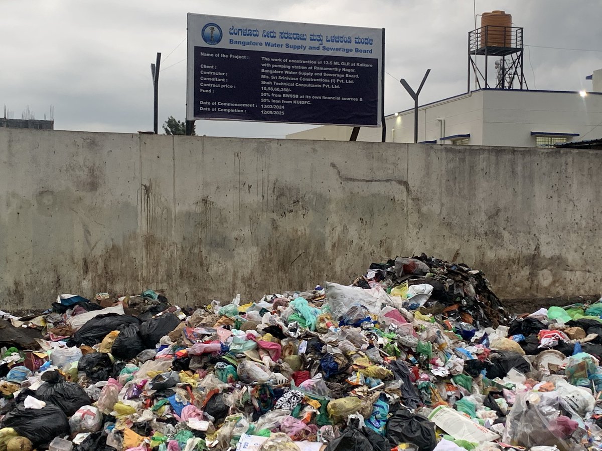 RakeshKris's tweet photo. This is the upcoming BWSSB water tank area right opposite to our flat in NRI layout, TC palya. Please see the picture which was taken on Bhoomi puja day done by honourable minister @BABasavaraja. Now the road is a garbage dump yard which is an approach road to our apartment 😔😔 https://t.co/74dhreOsa4