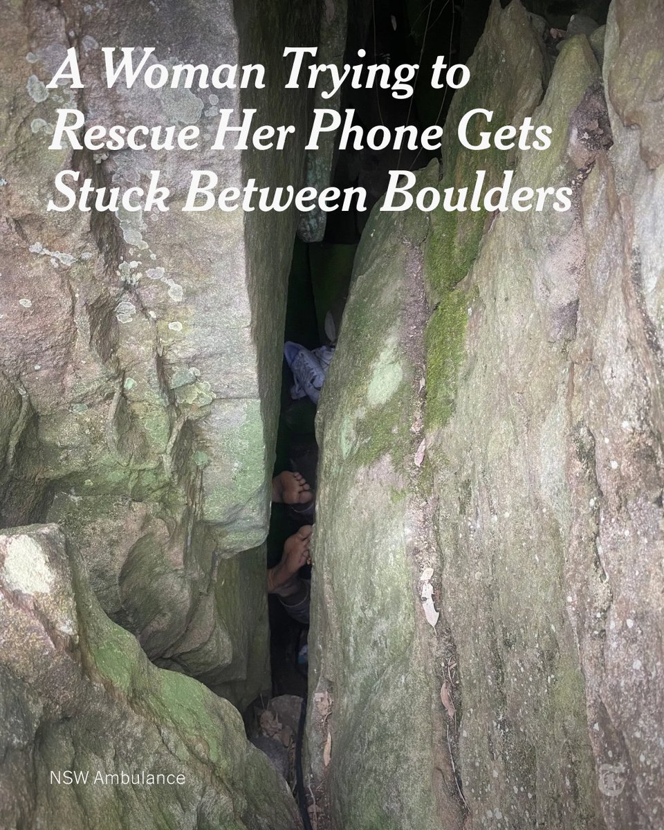 nytimes's tweet photo. A woman in Australia was with her friends in a wine region north of Sydney when her phone fell between boulders. 

She tried to retrieve it but slipped and got stuck between two boulders — eventually finding herself upside down. https://t.co/tuaSwCNbHs https://t.co/iSEreDGTa5