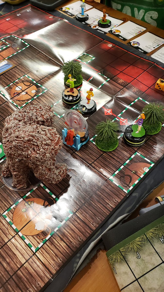 Crumpler64's tweet image. A highlight of Choas Night in Heroclix. Go ahead and guess what is happening here.