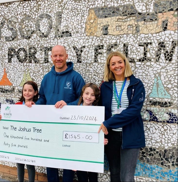 Thanks to everyone form the school community that has supported our fundraising for the Joshua Tree recently. 

Through our Wyddfa 3 peak challenge, Go For Gold day and Mia's busking we have managed to donate £1,545

Diolch yn fawr