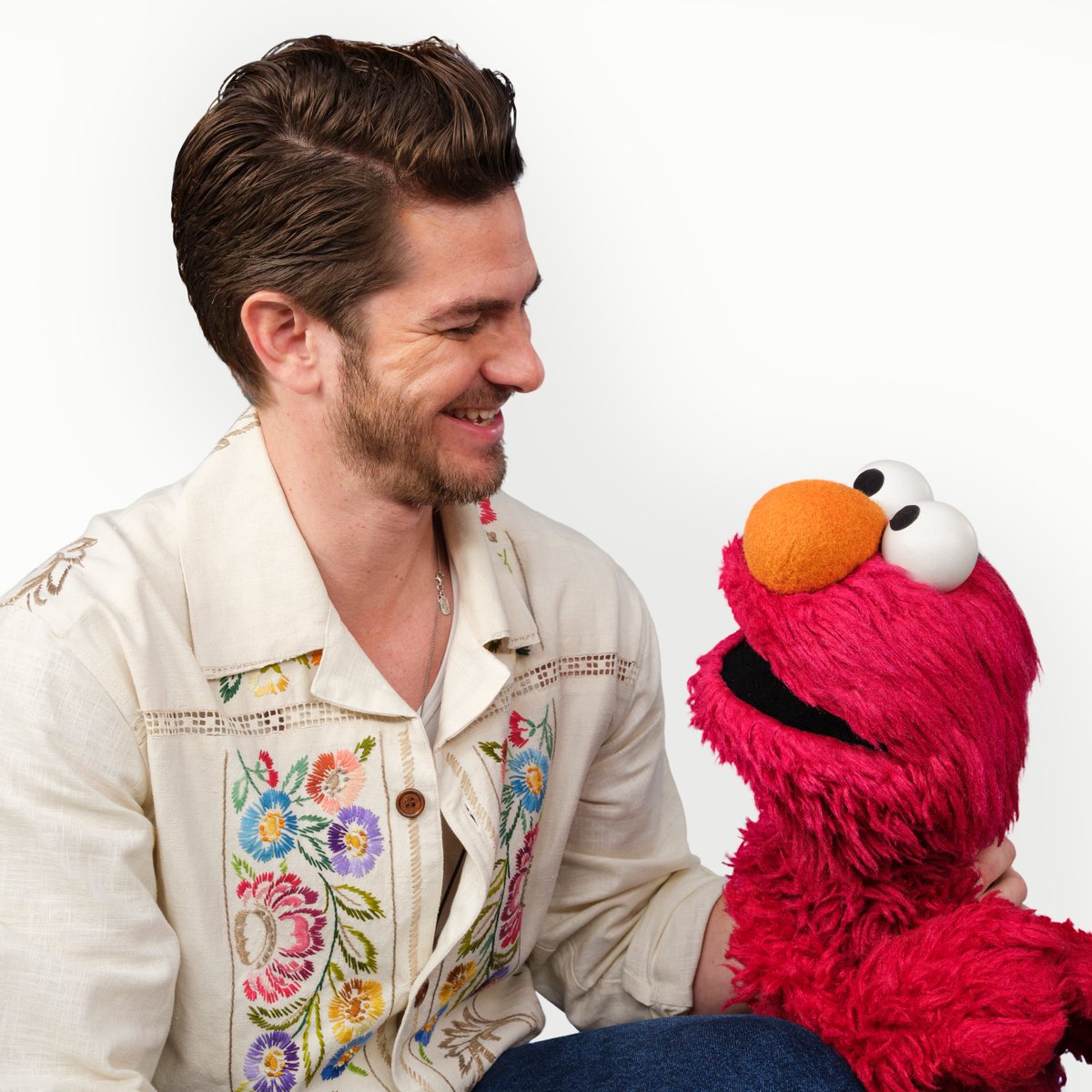 elmo's tweet image. Elmo feels so lucky to have a friend like Mr. Andrew. Thank you for making Elmo feel smarter, stronger, and kinder. Elmo loves you. ❤️