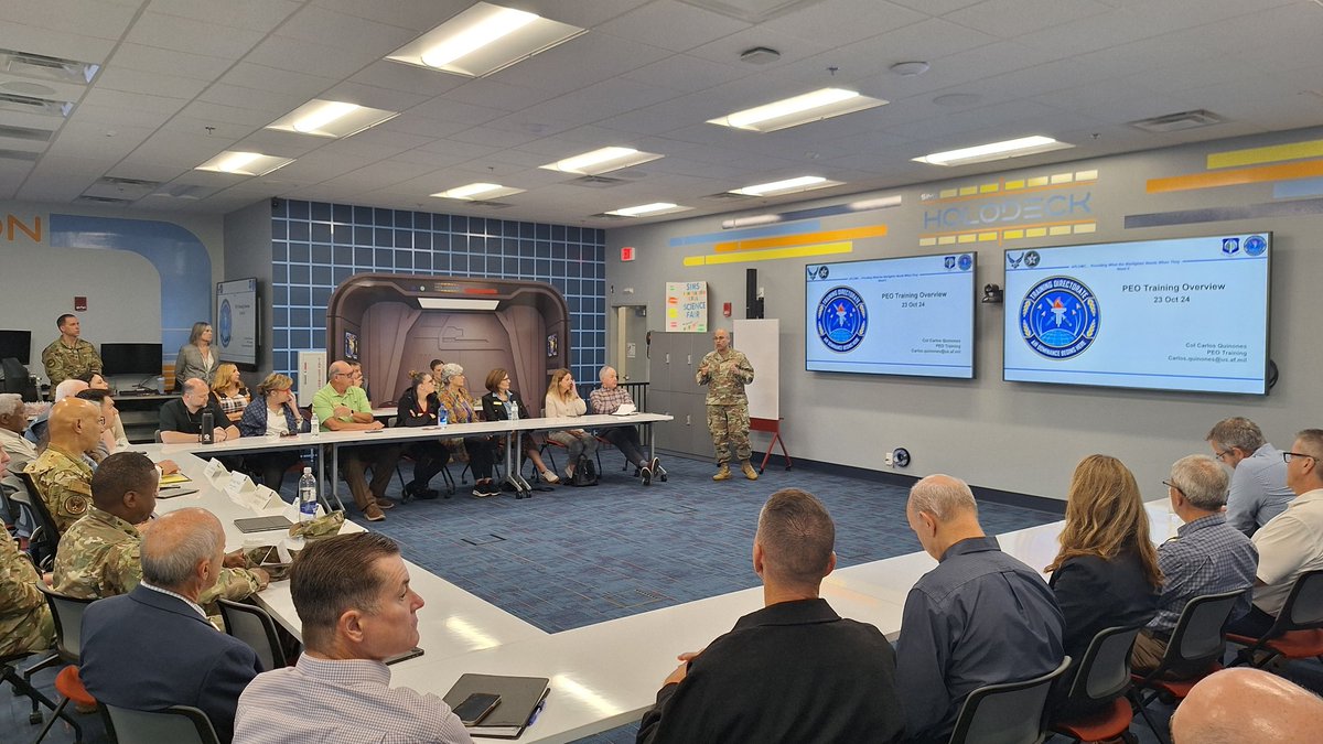 AETC leadership &amp; members of the Command's Civic Leaders Program visited the #AFLCMC Air Force Uniform Office earlier today.  In the first photo, Tracy Roan, Chief of the Uniform Office, shows off Air Force tops. 

(U.S. Air Force photos by Brian Brackens).