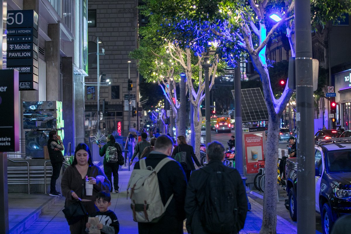 downtown_la's tweet photo. Have you seen 7th Street Restaurant Row's new glow yet?! Just last week, we flipped the switch on new lighting in nearly 30 trees along 7th Street, from Hill to Figueroa, and bathed Downtown in @Dodgers Blue! You can catch our Dodgers-themed lighting through the World Series run! https://t.co/BawTWbPhUD