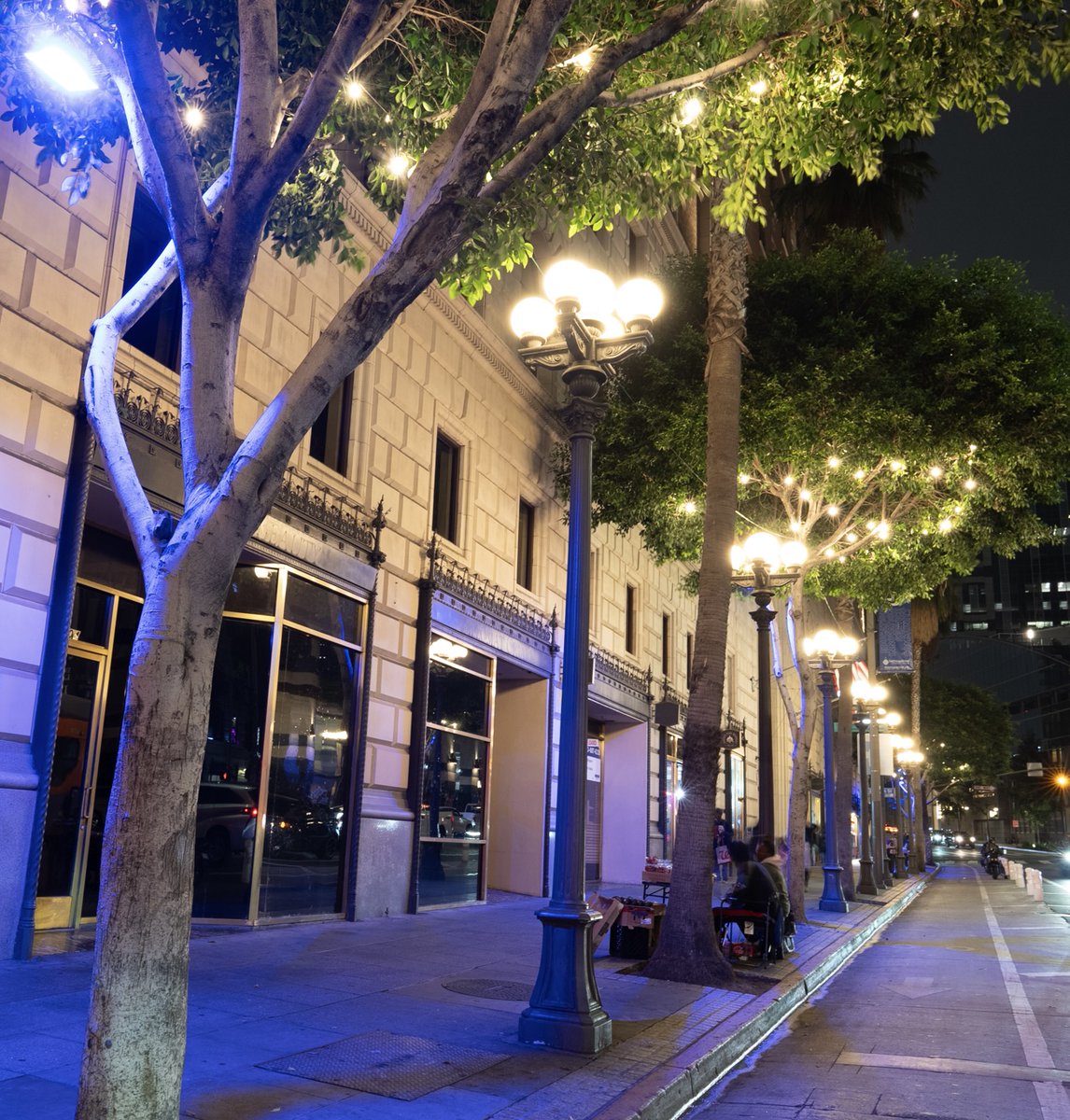downtown_la's tweet photo. Have you seen 7th Street Restaurant Row's new glow yet?! Just last week, we flipped the switch on new lighting in nearly 30 trees along 7th Street, from Hill to Figueroa, and bathed Downtown in @Dodgers Blue! You can catch our Dodgers-themed lighting through the World Series run! https://t.co/BawTWbPhUD
