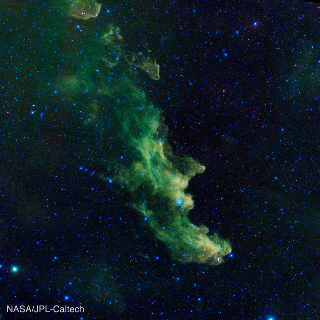 NASAUniverse's tweet photo. Double, double, toil and trouble … 🧙‍♀️

This screaming witch face is made by the billowy clouds of a nebula where baby stars are brewing. This WISE image shows dust in the nebula glowing in infrared light. https://t.co/EwbG1gd3A2 #NASAHalloween https://t.co/lnRfK3A7a6