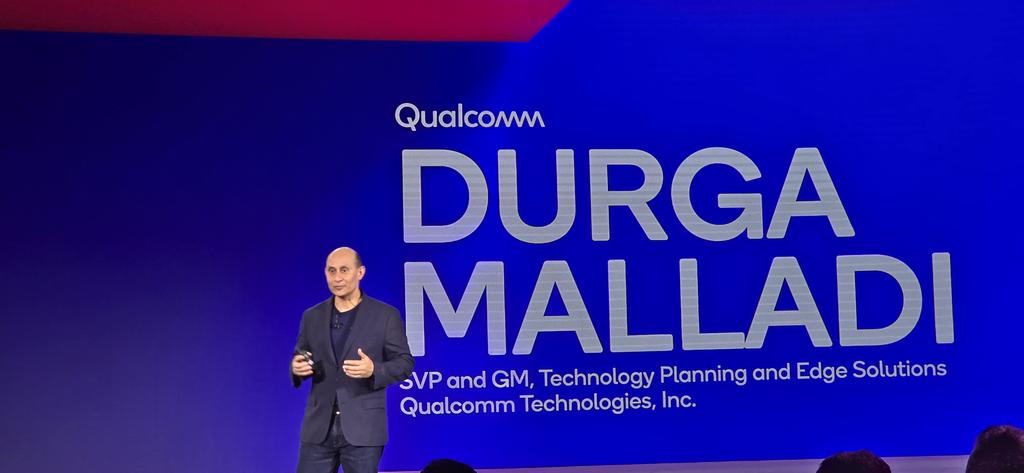 <a href="/Qualcomm/">Qualcomm</a> <a href="/nakulduggal/">Nakul Duggal</a> <a href="/Snapdragon/">Snapdragon</a> <a href="/AnalystSoumen/">Soumen Mandal</a> <a href="/Inquisitiveme17/">Mohit Sharma</a> <a href="/MobilePeter/">Peter Richardson</a> <a href="/MercedesBenz/">Mercedes-Benz</a> <a href="/Li_Auto_/">Li Auto</a> <a href="/Google/">Google</a> <a href="/geffgen/">Gretchen Effgen</a> <a href="/donnymac/">Don McGuire</a> <a href="/cristianoamon/">Cristiano R. Amon</a> <a href="/CounterPointTR/">Counterpoint Research</a> <a href="/BradyWang10/">Brady Wang</a> <a href="/Snapdragon_IN/">Snapdragon India</a> <a href="/MercedesAMGF1/">Mercedes-AMG PETRONAS F1 Team</a> <a href="/TotoWolff_/">Toto Wolff</a> <a href="/GadgetFreak4U/">Ritesh Bendre</a> <a href="/EpicGames/">Epic Games Store</a> <a href="/UnrealEngine/">Unreal Engine</a> <a href="/Bill_Clifford/">Bill Clifford</a> <a href="/Rivian/">Rivian</a> <a href="/WassymBensaid/">Wassym Bensaid</a> <a href="/amazon/">Amazon</a> <a href="/anshuman_saxena/">Anshuman Saxena</a> <a href="/salesforce/">Salesforce</a> <a href="/tonkra89/">Tony Kratovil</a> <a href="/nuvia_inc/">Nuvia Inc.</a> <a href="/axios/">Axios</a> <a href="/inafried/">Ina Fried</a> <a href="/Qualcomm/">Qualcomm</a> AI Chief <a href="/durga_malladi/">Durga Malladi</a> on stage putting into context the "shift" to AI at the edge.

"We have very powerful computers in our pockets which can process and inference multiple computations at low power, so one doesn't need to send AI pings to cloud which saves