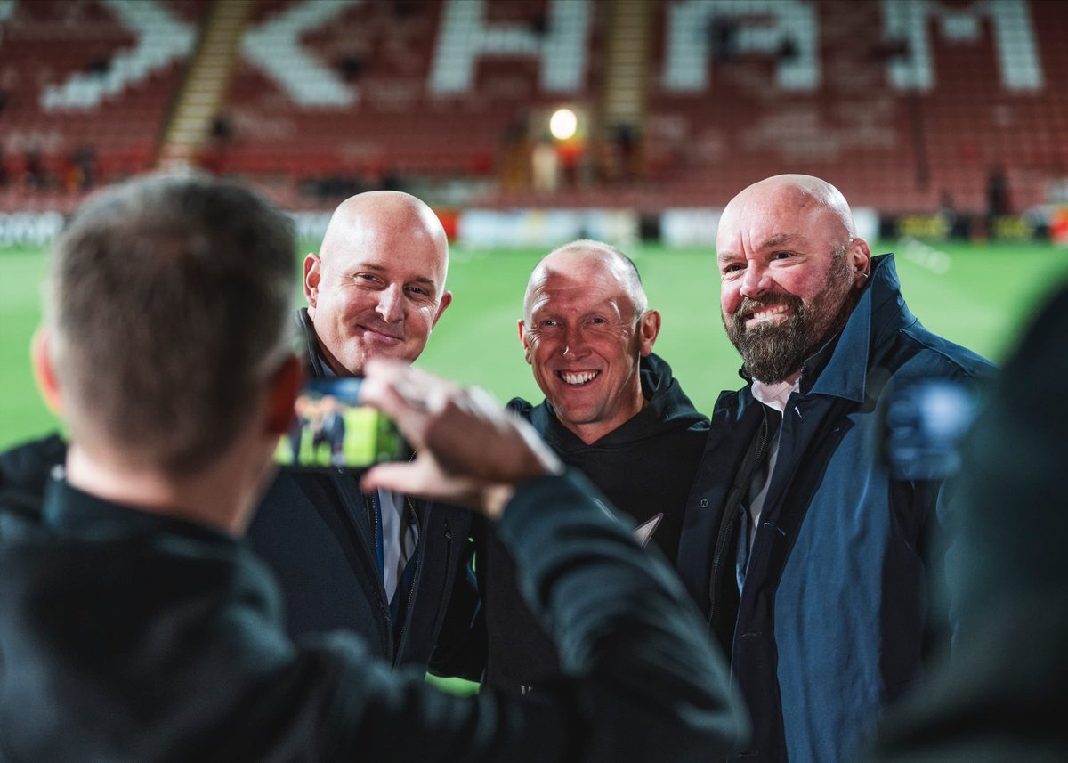 andymorrell01's tweet photo. The best thing, from personal POV, was catching up with these ex-teammates & friends. Been far too long & zero hair, but these guys were a huge part of me settling in and loving life @Wrexham_AFC. Mark & Jake (housemate) @htafc great to see u guys doing so well #matesforlife β€οΈ https://t.co/VeTdBAcXim