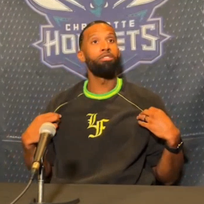 Charles Lee wearing LaMelo Ball's LaFrancé brand for pregame media availability. 👀
