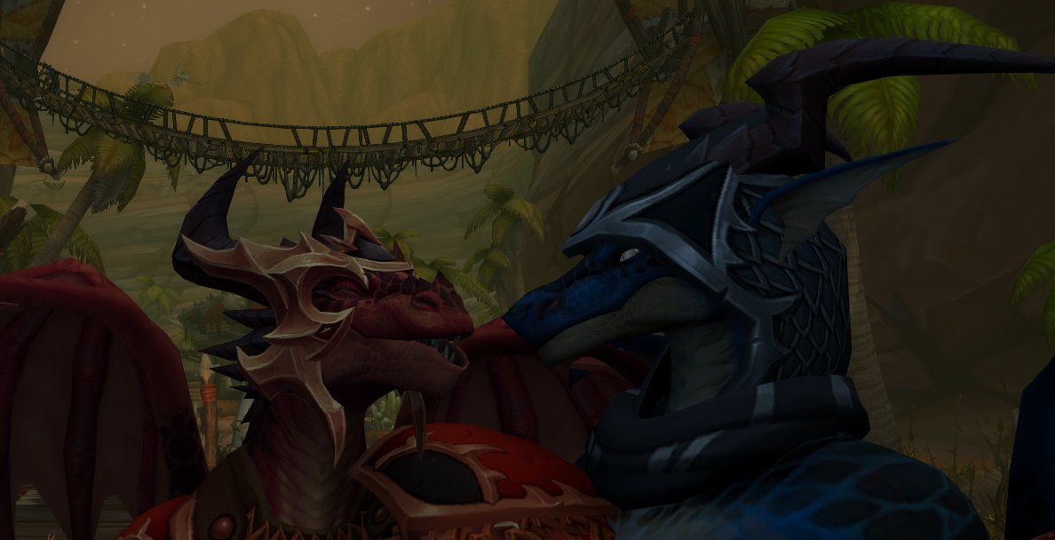 Blue (It's me) Red (<a href="/mim_such/">SuchMim</a>).

" Red: Won't you give me a kiss, Blue?
" Blue: Bleh. Have you washed your fangs? Your breath smells like the Goblin Kebab.