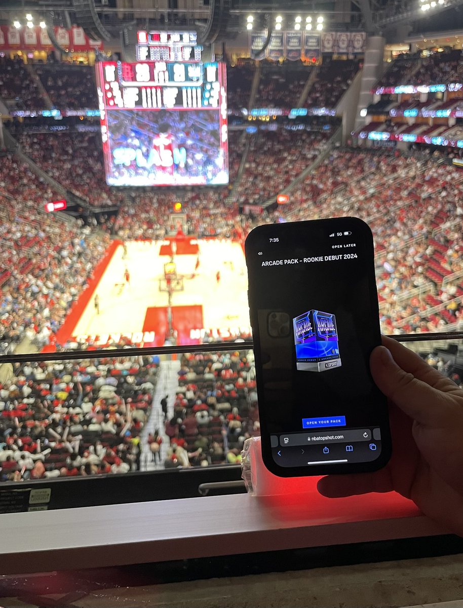 htown_texan's tweet photo. Ripping rookie packs at the @HoustonRockets home opener! About to see Reed Shepards debut moment! #Liftoff  @SccTopshot @leet3_ @TheHtownKid @NBATopShot #NBATopShotThis 🚀🚀🚀 https://t.co/aeu3xo2EcO