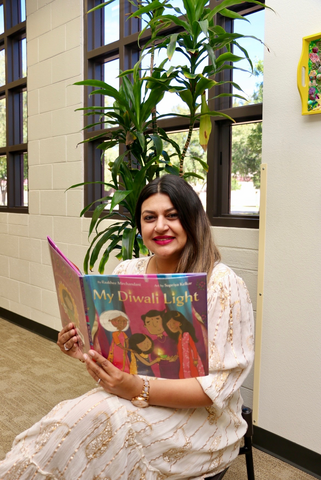 This Whatcha Reading Wednesday features Library Specialist, Amandeep reading My Diwali Light by Raakhee Mirchandani. 
Be sure to check our events calendar and join us for Diwali programming at the library! 
bit.ly/3A0xcCL