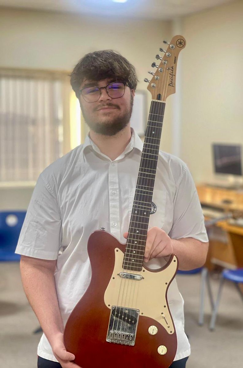 BSAKmusic's tweet photo. One of our Music Scholars, Cameron, decided he would like a microtonal guitar so he stripped off the original frets from this guitar and rebuilt it with a completely new system which enables him to create music with way more melodic and harmonic possibilities - amazing! 🎸🎸🎸 https://t.co/7RCdGtAy7d