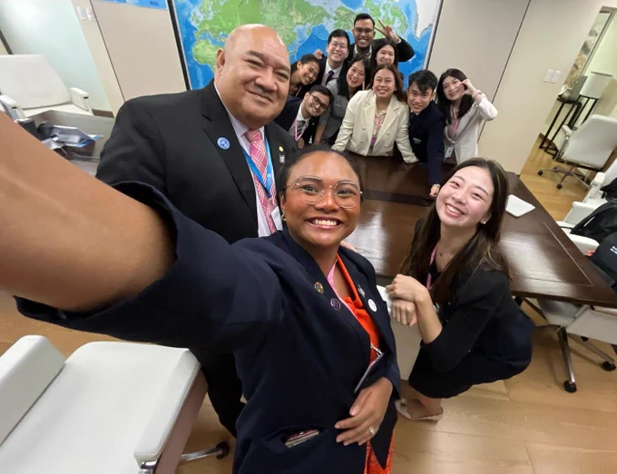 WHO Regional Director Doctor Saia Ma'u Piukala in selfie with representatives of the International Federation of Medical Students Association and the International Pharmaceutical Students' Federation 