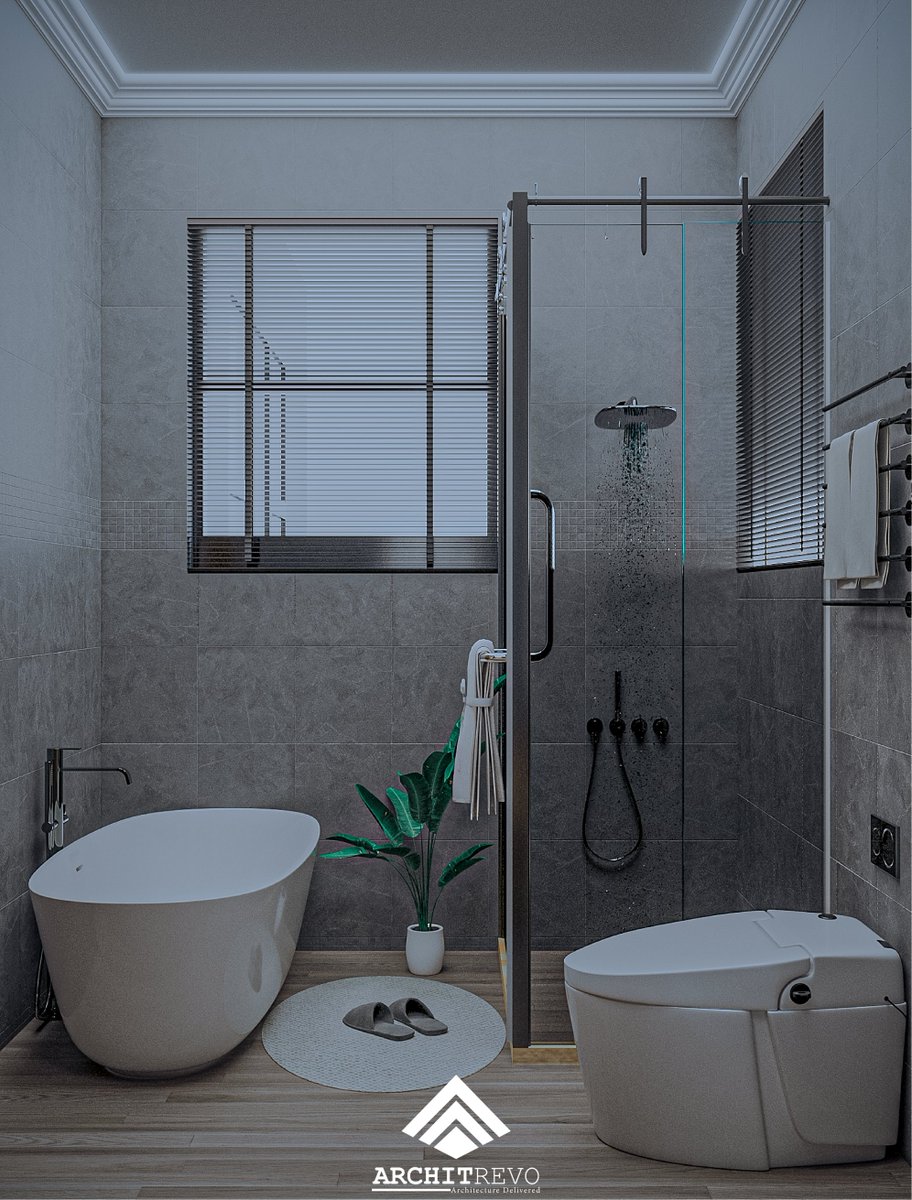 architrevo's tweet photo. An elegant bathroom design we worked on with a sleek glass-enclosed shower, large-format gray tiles, and an opulent freestanding tub. Warmth is added by the natural wood flooring, and the modern look is accentuated by the simple fittings. 
#ModernBathroom  #InteriorDesign https://t.co/rxVnLiihqL
