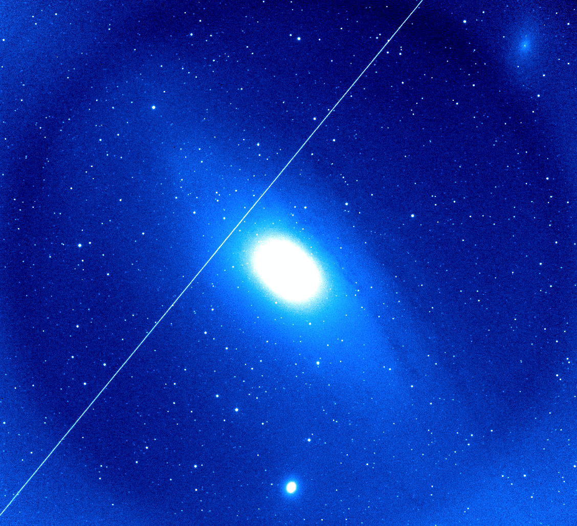 BeaconObs's tweet photo. We did some guider testing last night during twilight, and picked M31 as a random target. It is obviously too large for our FoV and we only did a single 2min I-Band exposure with a still very bright background gradient. https://t.co/u0dpnV6IyO