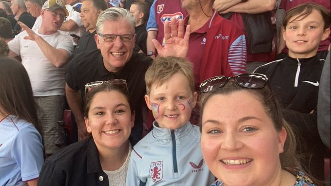 espenstrand's tweet photo. I DIDN'T CHOOSE ASTON VILLA....IT CHOSE ME...
Featuring Gary Lennon

My Name is Gary, and I am a Villa fan🦁
I've lived in Stourbridge, but lately in Kidderminster🏴󠁧󠁢󠁥󠁮󠁧󠁿. Local/UK fan.

@AVFCOfficial #VillaChoseMe #UTV #avfc🦁

STORY8⃣1⃣

Here is my Villa story....
More than 50 years in, and football at Villa has never been better. My Villa journey began when I was chosen by my next-door neighbour, Mick Knight, who saw me in a Wolves strip playing football out front when I was around five. I was wearing this as I liked the colours in a sports shop in Blackheath. Mick told my mom, “Buy him a Villa scarf, and I'll take him to Villa Park.”
True to his word, he drove us near the Witton End on a Wednesday night in January 1972, and we walked up the bank and over the top. I was mesmerised by the AV floodlights, which sparkled in the pouring rain. We beat Shrewsbury 3-0 in the season we won the 3rd Division.

I found my first hero, Ray Graydon, and had my mom sew a number 7 made from a pillowcase onto my Villa strip, which had replaced the other one. Some of my greatest games at Villa Park were in the 1970s, beating Liverpool 5-1 and Albion 4-0, with Villa fans booing Andy Gray being subbed as he could have beaten Malcolm MacDonald for the most goals in the season.

I had season tickets in the Trinity, then the Holte, and was going away games from 1980 to exotic places like Portman Road, Roker Park, and St Andrews. I made it onto the pitch at Highbury in 1981, dancing around and watching the Clock End bouncing as we won the league. 
My first trip abroad, without my parents, was to Rotterdam, on the Harwich to Hook of Holland ferry, then train to Amsterdam and seeing the Red Light district at 17 was mind-boggling!
We got tickets on the day from a Feyenoord official and happened to be in the Bayern Munich end, wearing a Union Jack t-shirt! The Villa fans were much louder, so we walked around the ground through multiple gates to get to the other end. There are so many stories about that trip to recall.

For most of my adult life, I've lived in Stourbridge and, lately, Kidderminster. Most of my mates are Villa fans. We've seen great games, been to great places, and endured the same dross as everyone else. Swindon away to get promoted, BFR’s first game back at Sheffield Wednesday springs to mind. However, my favourite games at Villa Park must be beating Albion 4-3 and Blues 5-1 on derby days as the atmospheres were electric!

The pubs we used pre-match were in the 80s, The Costermonger, The Cabin, and The Windsor,
though lately we have used The Old Royal or Old Contemptibles. The ones close to the ground tend to be packed and slow serving time for beer!

My Villa story now extends to my daughters, Katie and Jess, who have their own stories. To my dismay, Jess was a mascot and walked out with Stephen Ireland when it could have been Carew!. Katie met her husband Brett on a Kidderminster Lions coach to away games, and a decade later, their 7-year-old son Leo is an avid Villan, too. We’ve been to Wembley, Crystal Palace in corporate last season, and lots before and in between, and they will see some of the best times coming up.

Watching players come through the academy, like Jack and Jacob, Sid and Gary Shaw, with claret and blue blood in their veins, is a delight. Yet when others come in, love the fans, and play for the badge like McGrath, Morley, Mortimer, Townsend, Atkinson, Taylor, Hutton and many more, it feels an honour to be a fan.

My favourite player ever? John Carew, cos he’s bigger than me or you……and now, Emi Martinez, who could become our best-ever signing!

Seeing Villa in the Champions League is a stepping stone for the next phase of the journey. It is amazing to go to Mostar, Lille, Bern, and soon Monaco, to smaller grounds with passionate home fans. Yet once again, we shall be in Barcelona, Madrid, and Roma at the top grounds in the biggest of games.

Thank you, Unai.

Thats my Villa Story!💜💙

Kind regards
Gary

Up The Villa

NAME's Twitter handle: @GaryJohnLennon🦁

Didn't choose.. picture created by - [@avfc_edits]