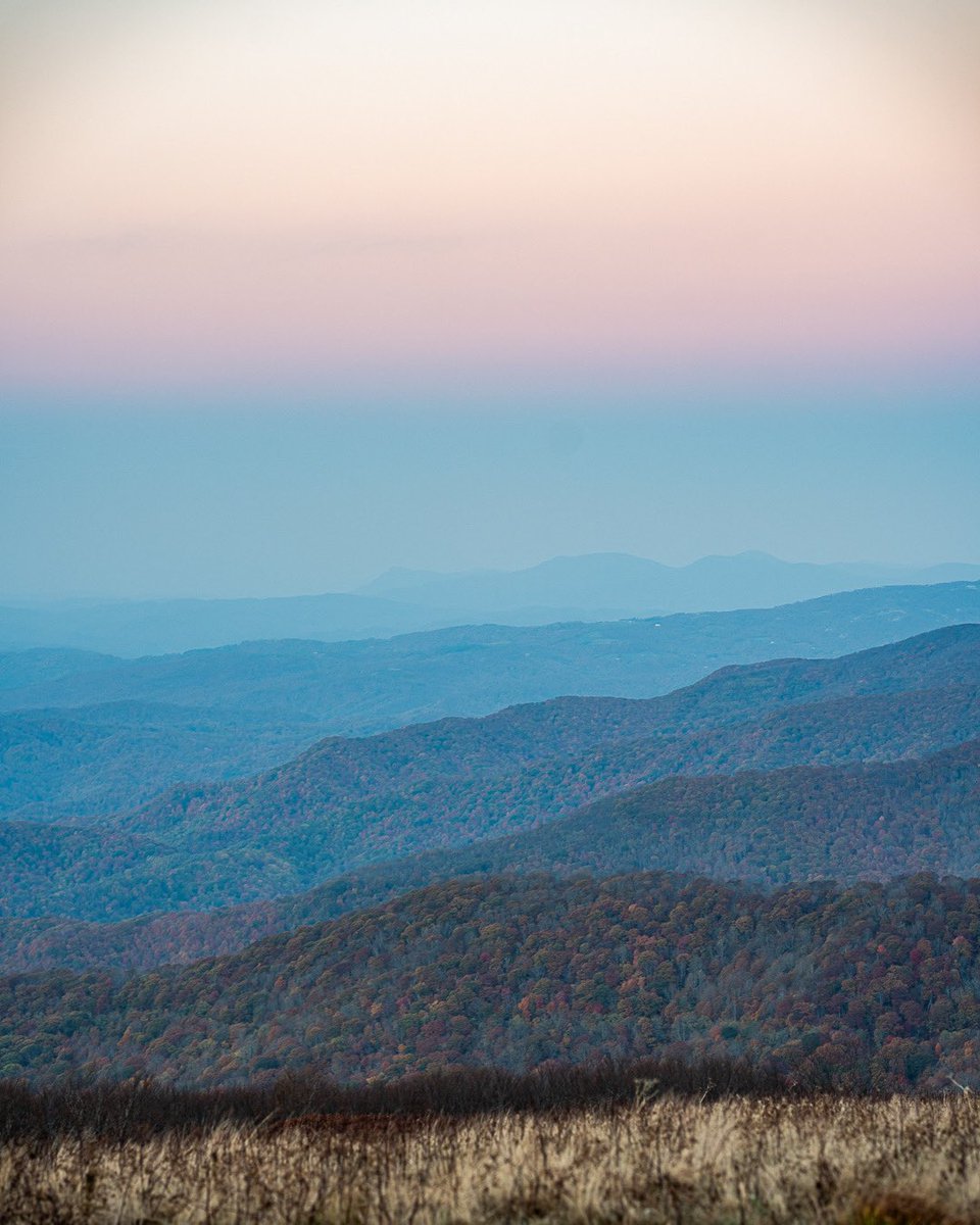 AshevillePictu1's tweet photo. Mountain layers with fall colors last night - The nearly miraculous pace of the road repairs by the Army, National Guard, and private contractors that made reaching this place possible (and the overall response to this disaster) should make all of us proud to be Americans https://t.co/pkpmnU2q7p