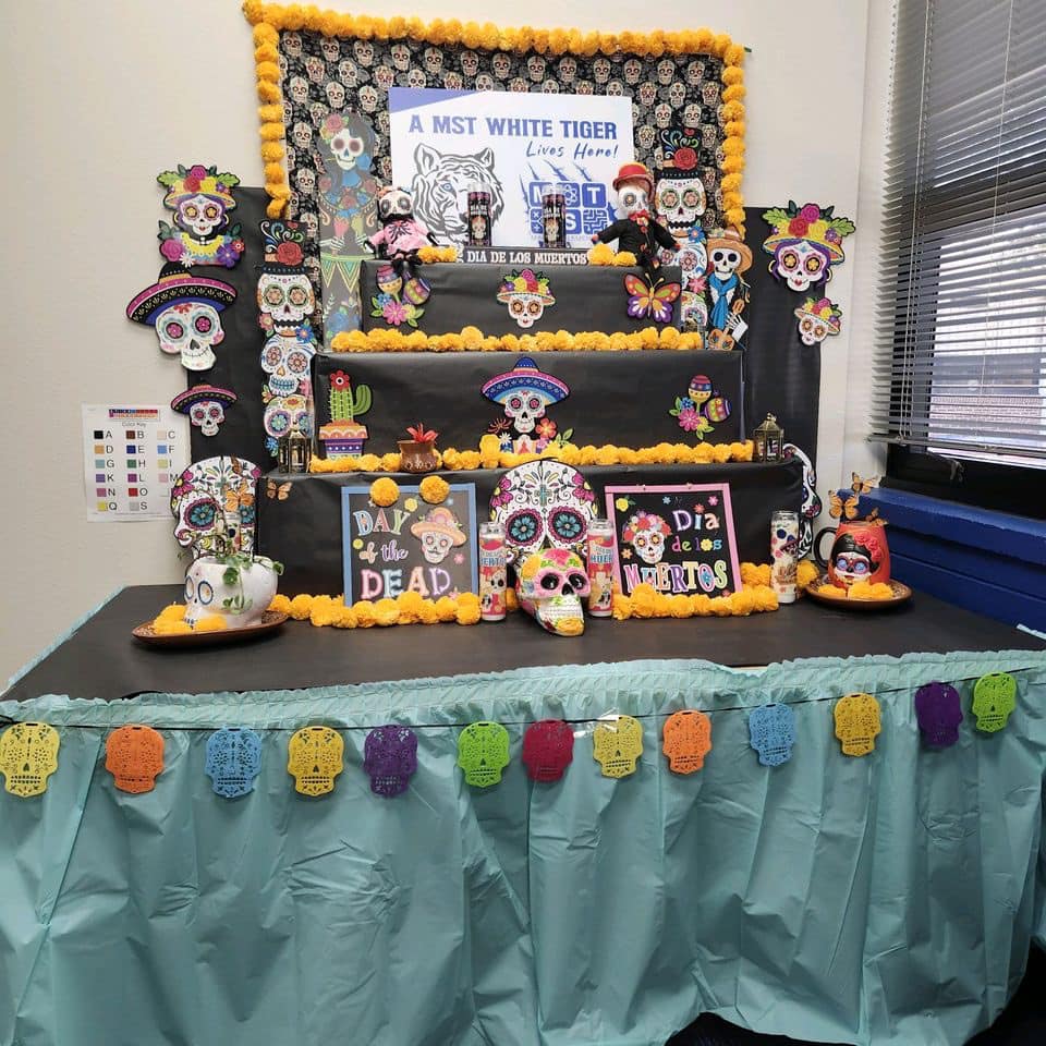 Parents! While you’re at Book Fair or visiting the school, you’re invited to check-out the Altar de Muertos, located in the library, displayed in the months of October and November.