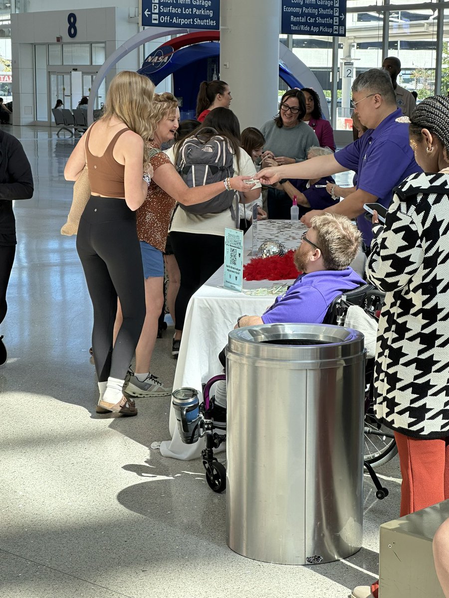 Doctor_Swiftie's tweet photo. Nola’s airport knows how to welcome swifties 😍😍 there’s even a table for face painting and glitter too! @MSYAirportHotel https://t.co/O4lVZM2nXr