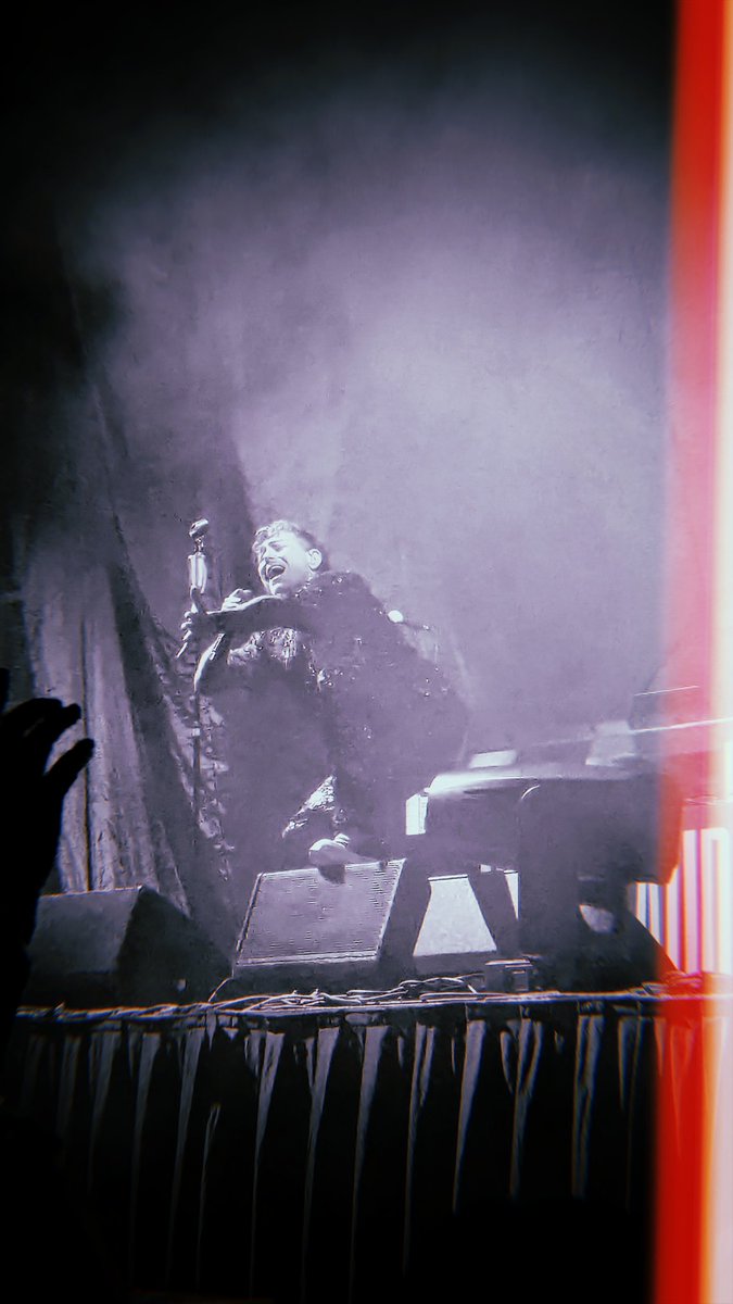 Finally caught <a href="/blaqkaudio/">BlaqkAudio</a> at the Aragon last night. 🖤

Limited stage lighting but I did snap 2 lil shots of <a href="/DaveyHavok/">Davey Havok</a> who, despite the sequins, was often draped in darkness. (Very on brand.)