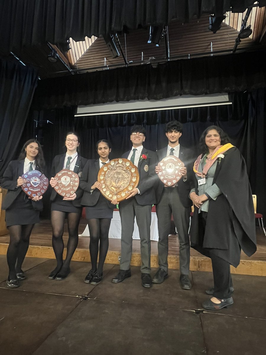 HousesQmgs's tweet photo. Congratulations to Petypher house for winning the trophies for community awards and competition component of the house system. Congratulations to Petypher house captains, Kierat and Rueban in receiving the trophies on behalf of members of the Petypher house. @QMGS6THFORM https://t.co/m0moAom5Um