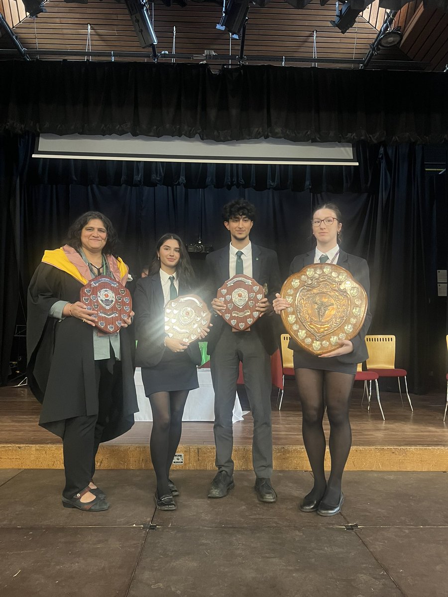 HousesQmgs's tweet photo. Congratulations to Darby house for winning the trophy for achievement house points +being the OVERALL WINNERS  for academic year 2023-2024. Congratulations to all Darby members and house captains, Amy &amp; Nishan in receiving the trophies on behalf of Darby. @QMGS6THFORM @QmgsDarby https://t.co/k7UFqdAdqa