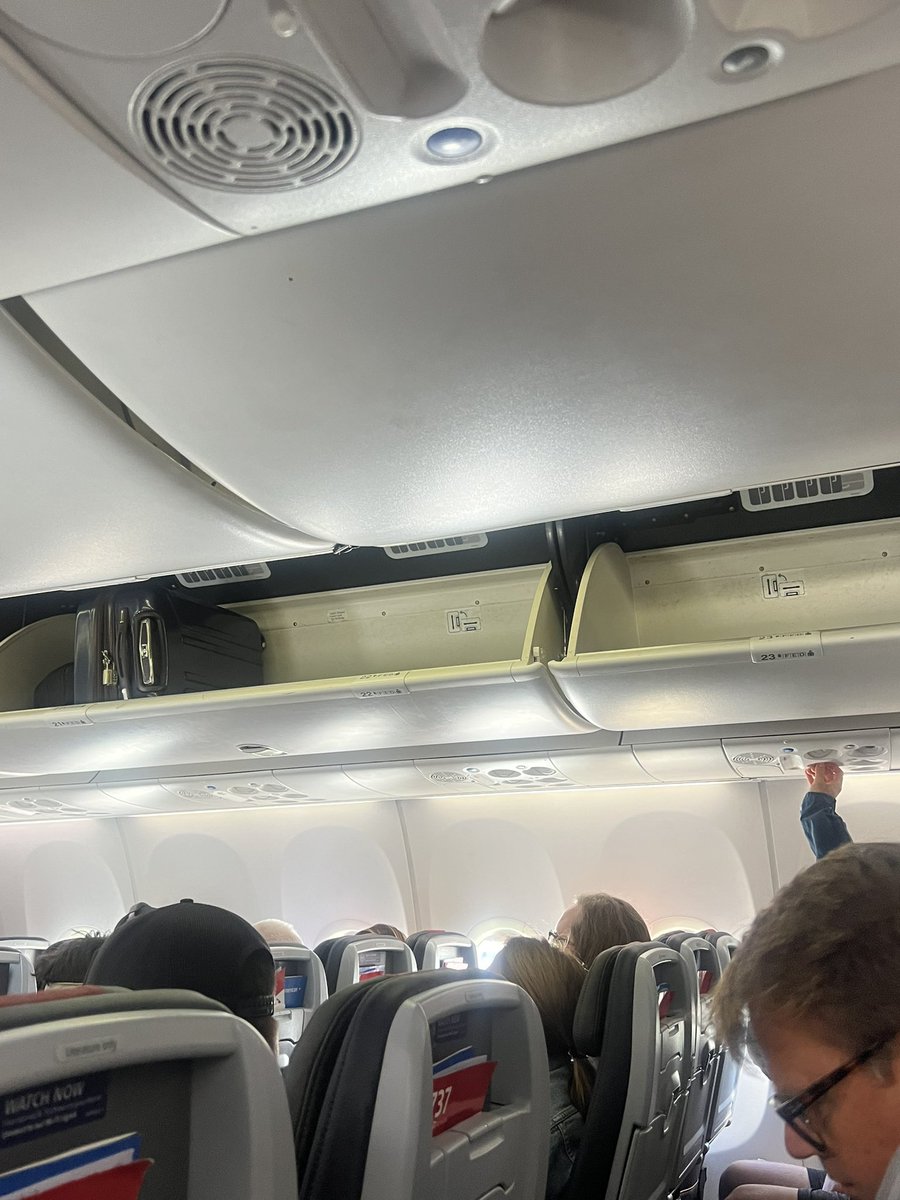 ashleydlc's tweet photo. @AmericanAir at their best again. Making everyone check bags because they are all full overhead bin capacity all, yet…. All along the plane.  Avoiding taller all costs next year. https://t.co/CVV1OE9Svd