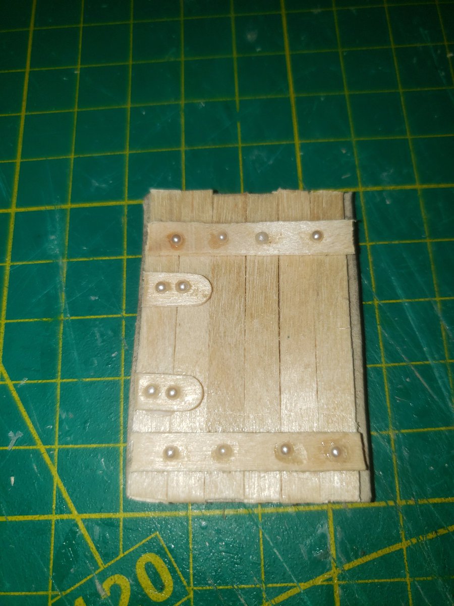 Spent far too long making this door. Even used beads for rivets like the kool kids do. Plan to make a mould and  cast them in future.