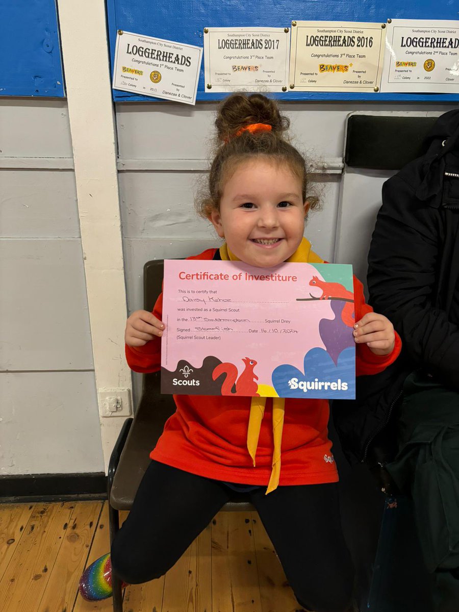 Daisy being invested in <a href="/scouts/">Scouts</a>. So proud of she loves squirrels 🐿️