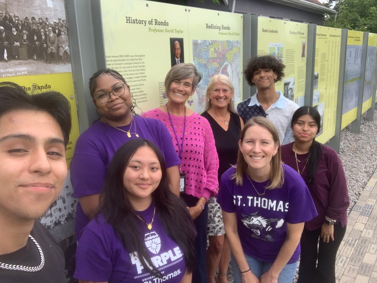 Molly McGraw Healy, Dr. Lynn Stansberry Brusnahan, and Dr. Kellie Krick Oborn alongside <a href="/StThomasDFC/">Dougherty Family College</a> interns at the Collaborative School at Maxfield Elementary visited Rondo Commemorative Plaza to learn more about the community.