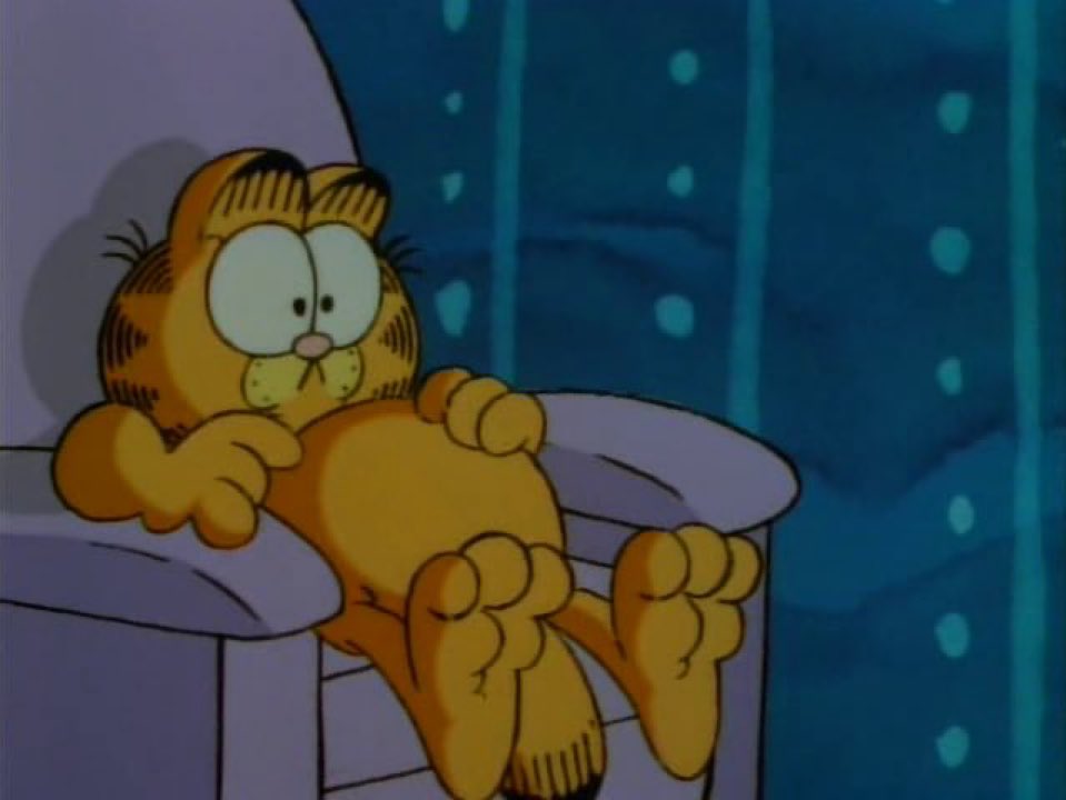 LostGarfields's tweet image. Garfield watches one of the VHS tapes Jon keeps in his secret closet with the sign that reads “KEEP OUT!!!”