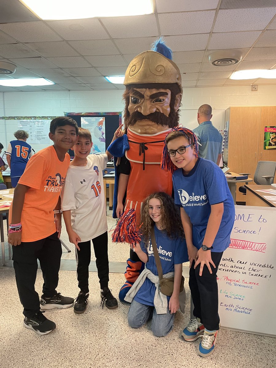 A few of our awesome student volunteers posing with the one and only Plaza Trojan at MYP night!! #ibunited #plazatrojans