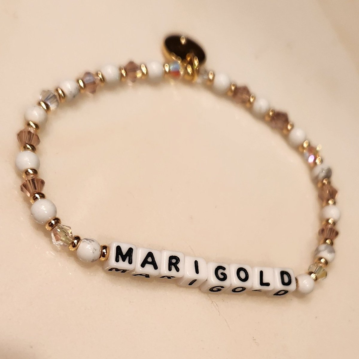 cmd_lms's tweet photo. Today, I learned what it means to be a marigold β to support, nurture and uplift others πΌ So thankful for this beautiful bracelet from @Pride_Pedagogy, which will be constant reminder to stay rooted in kindness and growth π©· #MarigoldMindset #Gratitude #PositiveVibes #BeKind https://t.co/4qjG4dbjRQ