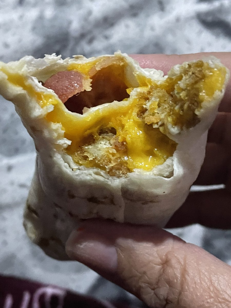 yoadrienne_79's tweet photo. @sonicdrivein why do I bother?Order in the app, 15 mins later I ✅ in. Waited ➕ 15 minutes for this mess. Queso wrap with no Queso. Soggy fries with gelatinous cheese making it one lump. A soggy yet BURNT “grilled cheese” burger, missing condiments, &amp; more. Waste of $20. No more https://t.co/zwC1igQz0X