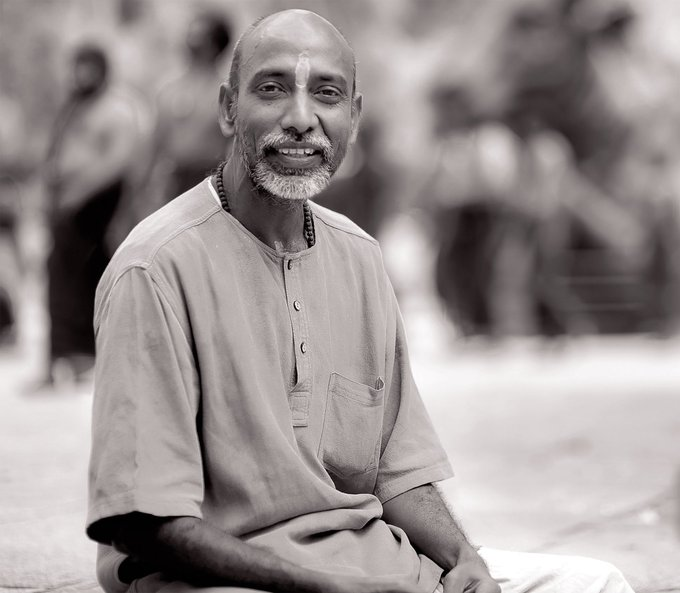 Ksareen30's tweet photo. Always at the feet of the Guru- Swami Abhipada

"There was a government official came to visit long ago in the Isha yoga center and at one point there was no one to attend him. He got agitated " how come there is no one to assist me, I am (this from this). This is not good..."
Swami Abhipada met him and tried to calm him down. But looking at his anger, Swami ended up touching his feet apologized. This instantly made him silent. That man could not believe how can a monk touch his feet. He did not say much and completed his visit at the ashram and went back home silent.
Three days later he came back and met Swami Abhipada saying, "Swami I am not able to sleep for last 3 days". I wish I would know why it happened but as far as I knew him he was a pure soul. That was Swami Abhipada (Always at the feet of the Guru).
He was the first Brahmachari I met in Isha. Nearly 30 years he was with Sadhguru and the Ashram yet the depth of humbleness was immeasurable.
He was the first being who made me realise how the brahmacharis are here in the Ashram. He had made me realise that how important for us to be true to ourselves.
First time, I got to hear many stories of Isha and Sadhguru from someone other than Sadhguru.
Many untold stories that would have never come out otherwise.
I got the opportunity to be with him in both Coimbatore and in Bangalore. It was wonderful knowing him.
Yesterday, I was in Adiyogi Alayam, looking at his body laying down and people offering flower and love towards him for the last time. It just made me emotional because I always felt different whenever I saw him.
This time it made me realise about my mortal nature. I saw other brahmachari giving shradhanjali to him. I wonder how would they be feeling within themselves.
Indeed, it is truth that this is going to happen to all of us. But still it feels a great loss."
-Sharing by a Volunteer