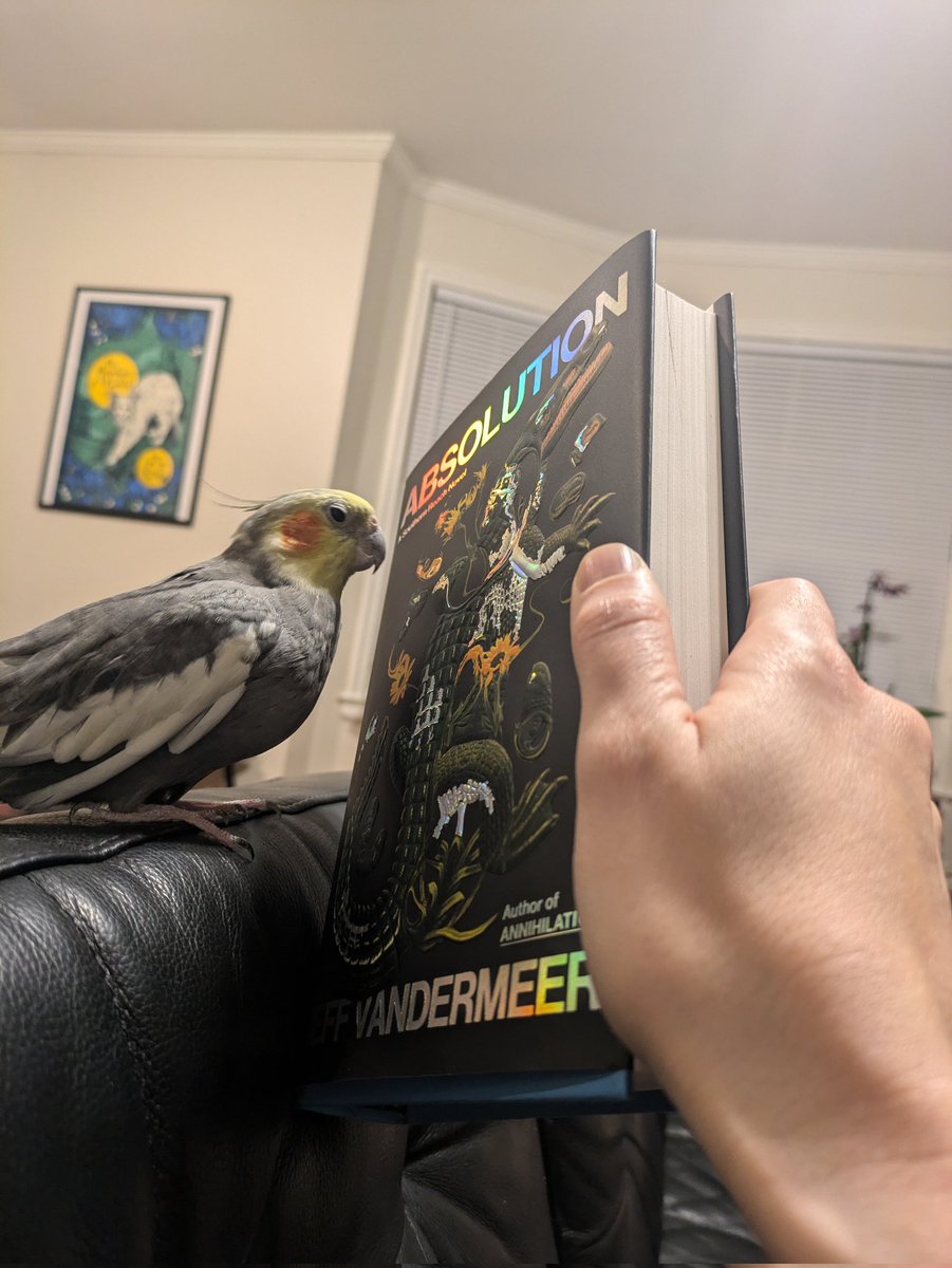 Phoenix is absolutely enthralled with the shiny cover. He's totally tranced out. Thank you Abby Kagan and <a href="/jeffvandermeer/">Jeff VanderMeer</a> for hypnotising my bird.
