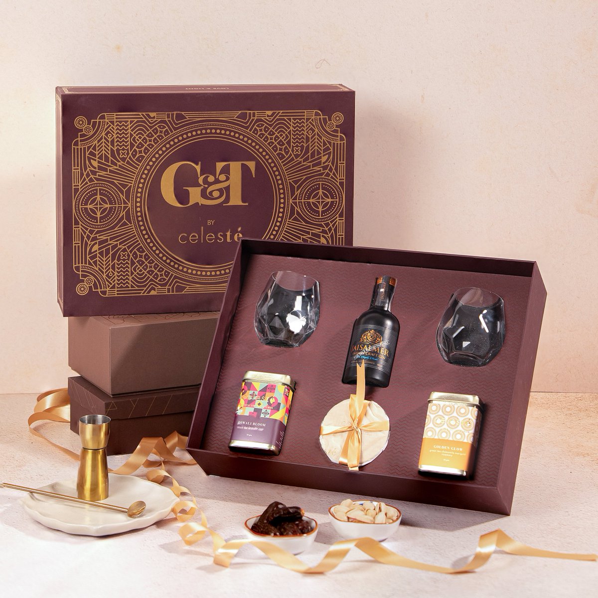 Light up your Diwali celebrations with our G&amp;T Gift Box! 🎇✨ Featuring a premium gin paired with two artisanal tea blends, Diwali Bloom and Golden Glow, it’s the perfect luxurious gift for this festive season. Share joy and sophistication with friends and family.