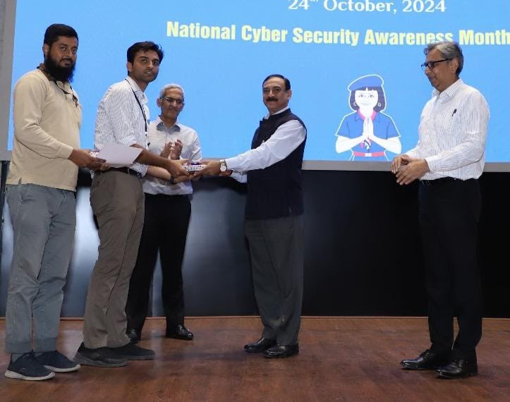 OfficialDMRC's tweet photo. DMRC organised a quiz competition for employees titled “Phishing for Answers: The Cyber Security Quiz” on Thursday to raise cyber security awareness among employees. 

DMRC's MD Dr. Vikas Kumar attended the event and presented prizes to the winners. Rashid Jamil and Saquib Mustafa won the first prize.