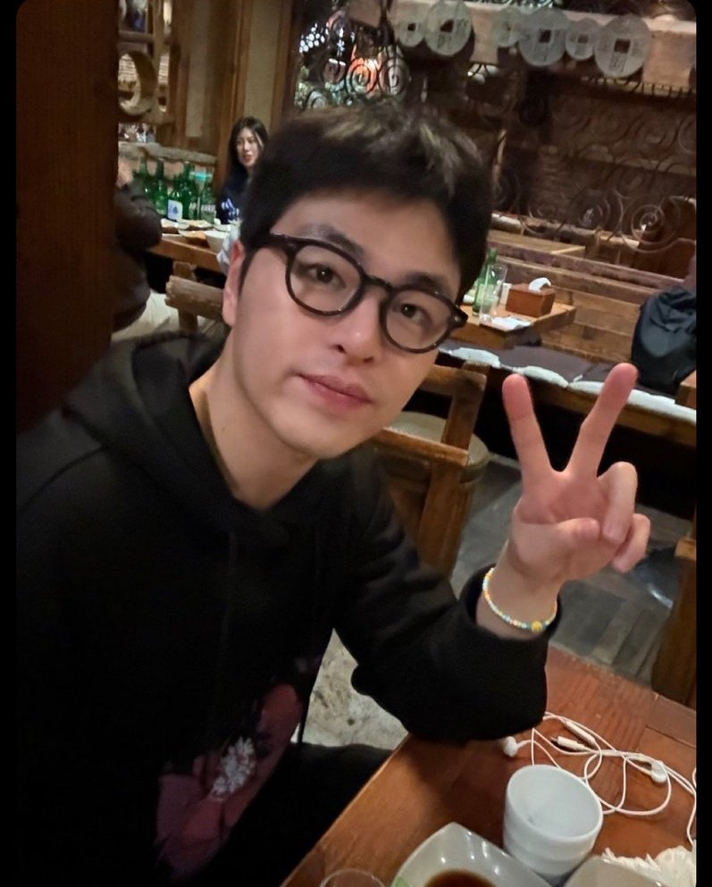 junhoe wearing specs and cute bead bracelet 🥰