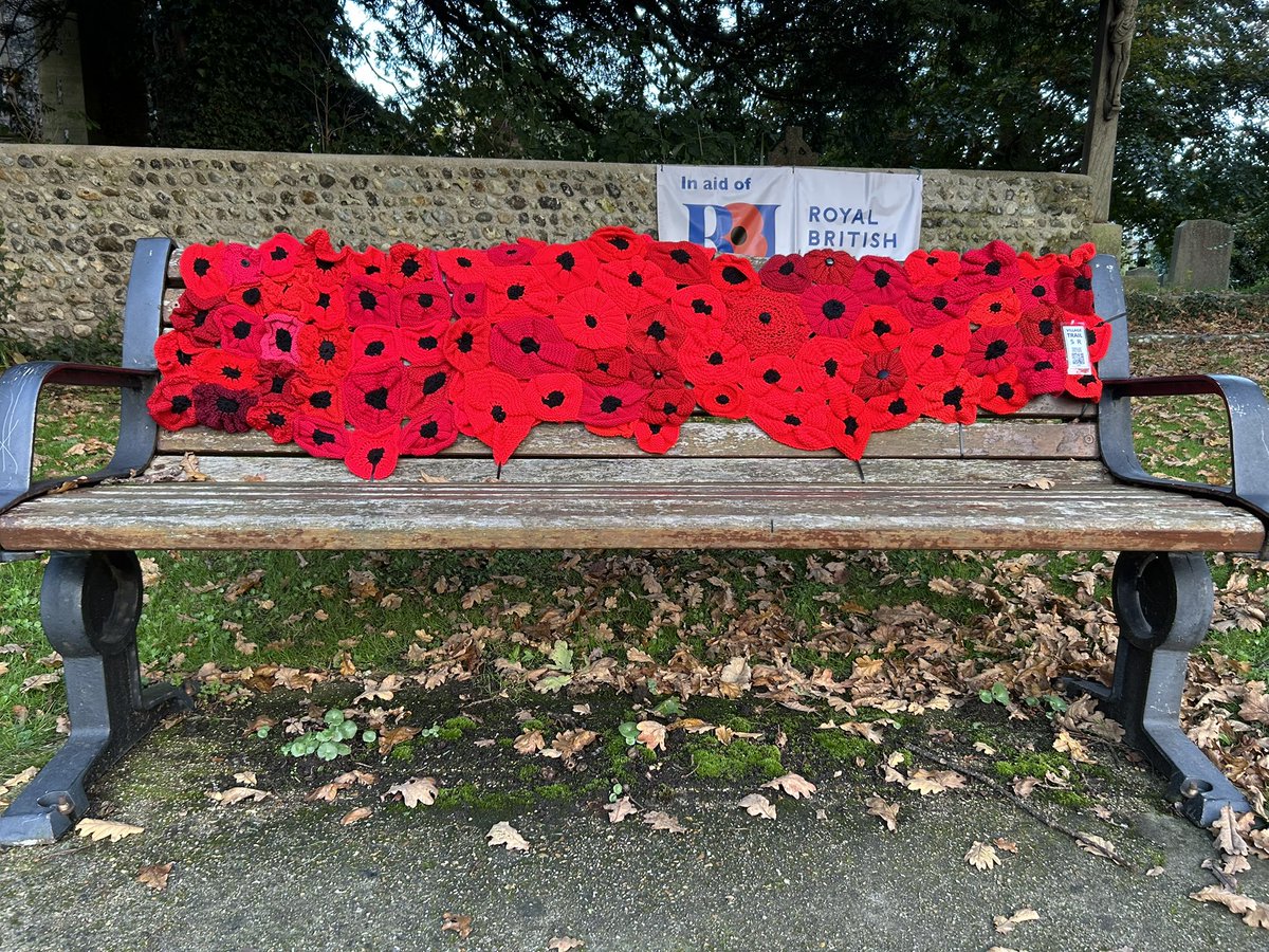 Our village yarn bombers have upped their game for this display.