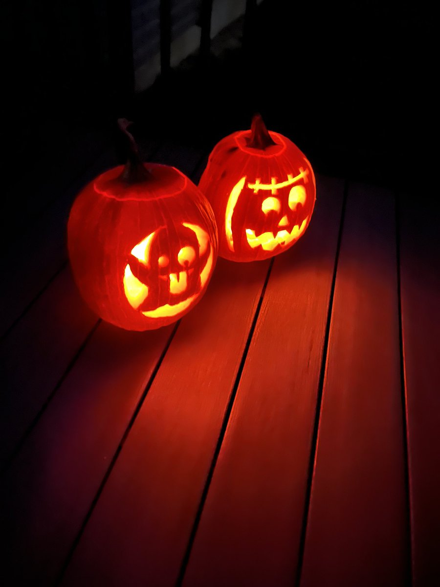 These showed up on the deck. Pumpkin carving has become a work of art. #Halloween